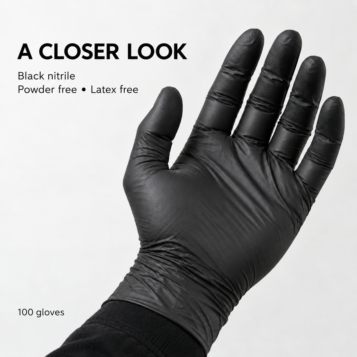 Close-up of black nitrile gloves – 100 pack
